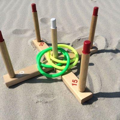 Beach games, like Ring Toss from LBI DreamMakers, keep the kids busy on the beach while you relax with your book.