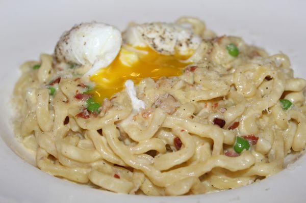 The creaminess of the sauce was enhanced by the fresh egg served atop the carbonara.