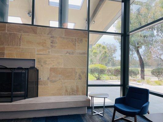 Corners to study with a fireplace and nice outdoor view