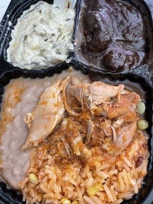 Hot food. Rajas con crema y elote, mole con pollo, tinga de pollo, arroz, frijoles.