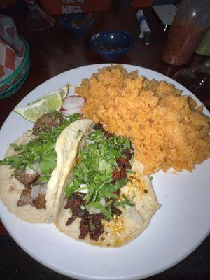 Two tacos, asada and chorizo both delicious