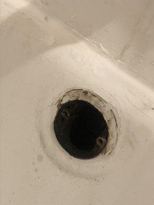 The bathtub drain, hasn't been cleaned properly in years! Yuck!