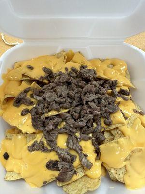 Carne asada nachos with cheese