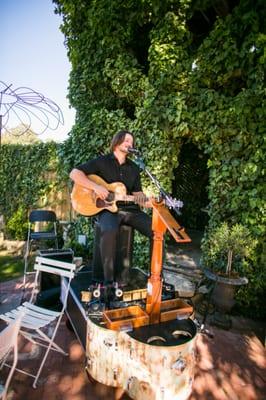 Marcus and his One Man Band set up at Dana Powers House during cocktail hour