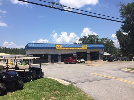 Battery Source and Mini Storage on nine mile road across from Scenic Hills Veterinary Hospital.