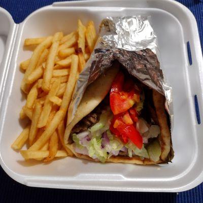 gyro and fries and a bad reflection on the foil