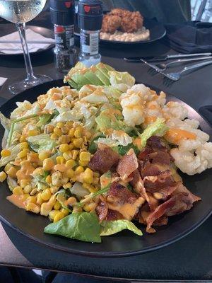 This salad was the house cob with fried lobster!  Delicious and enjoyed with a glass of sparkling wine!