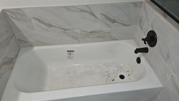 Tub installation, that I now have to get on my hands and knees to clean up.