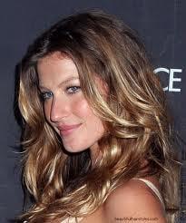 This highlight technique is called balayage.  It's actually an old school French technique.  Creates a natural "beach" look.