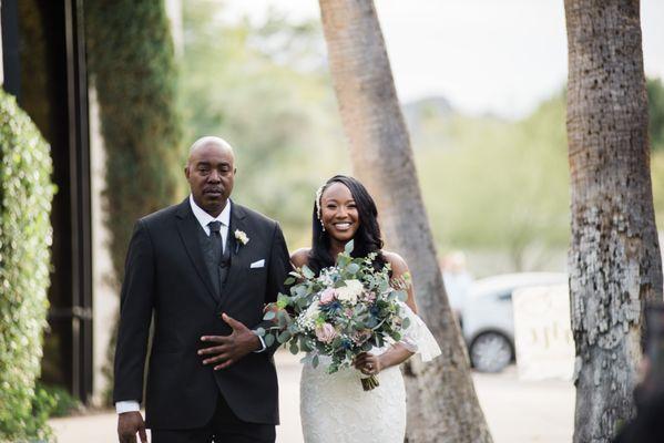 Desiree's father escorting her down the aisle!