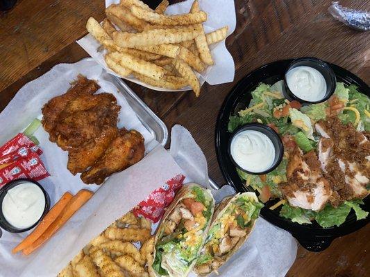 Wings, chicken wrap, chopped salad