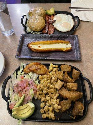 Llapingacho (potato patties), maduro con queso (stuffed plantain), fritada (braised pork). So delicious!