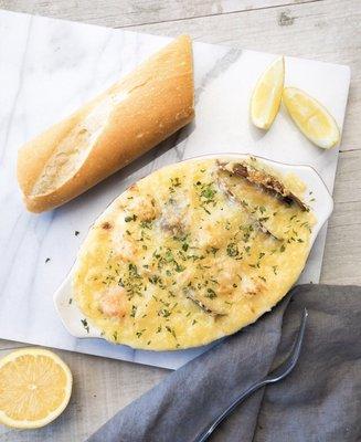 Seafood bake topped with grilled cheese