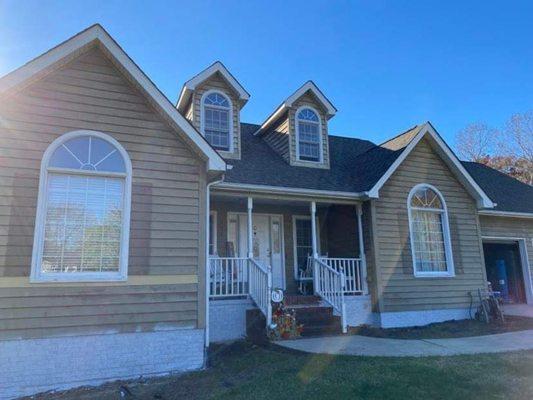 This client wants to preserve there siding for a few more years so we gave this lake house a brand new look!