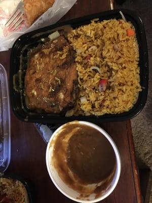 Chicken Egg foo young combo plate with pork fried rice. Two patties of egg foo young, gravy came on the side.