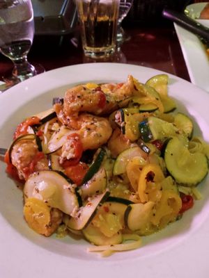 Chicken with roasted peppers, hot pepper rings and zucchini over linguine