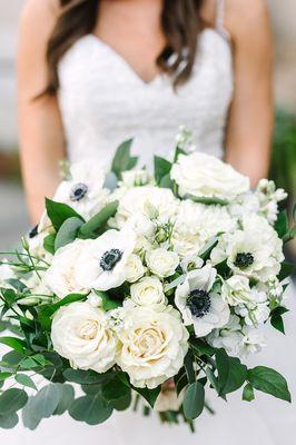 Gorgeous white and ivory bouquet with the perfect pop of anemones.