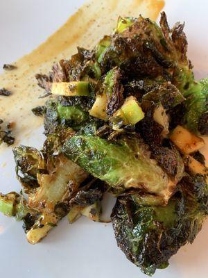 Fried Brussel sprouts with red miso caramel, apple, and togarashi