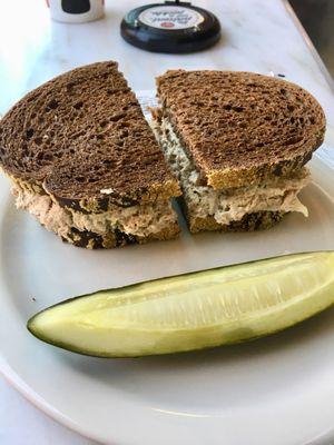 Tuna salad on pumpernickel bread