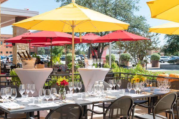 Wine and Cheese Tasting setup on the patio facing the green space