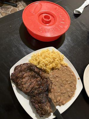 Delicious rib eye with rice and beans.   Fresh grilled and delicious