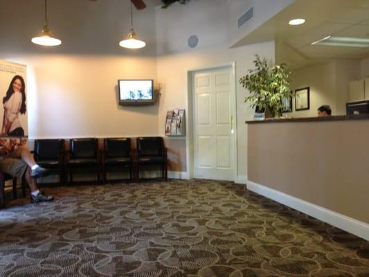 No more half walls by the door, new carpet. Much nicer looking lobby.