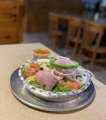 Salad with rolled meats