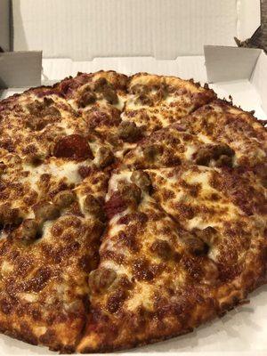 Large pepperoni and Italian sausage pizza. Quality handmade pizza