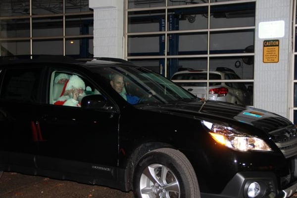 Santa arrives in a Subaru