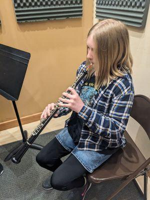 Trying out the oboe.