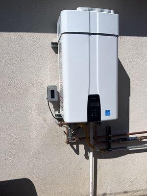 Relocate Tankless outside.