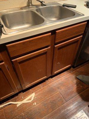 Customer -  Brian T. 
Sink and counter area that has water damage before any work has started.