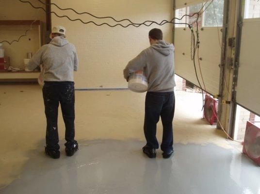 Example of installation of Epoxy Central using spiked shoes to walk on the paint.