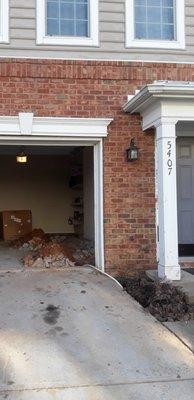 how the garage floor was left after the leak was stopped