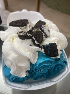 Cookie monster ice cream roll topped with oreos