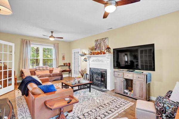 Sitting Room with large flat screen TV and plenty of space to sit