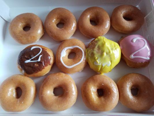 One dozen graduation senior promotion graduation donuts.