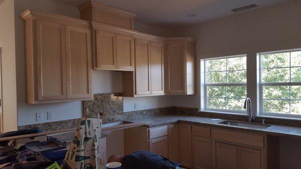 Kitchen Cabinets: Clear conversion varnish on natural maple.