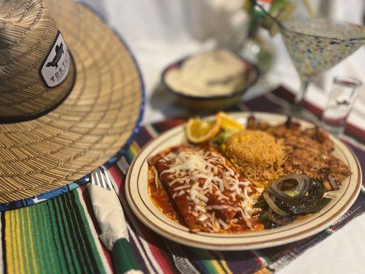 Savor our Grilled Chicken & Enchilada Special! Served with rice, veggies, and a side of Mexican charm. A taste of Tortuga's finest