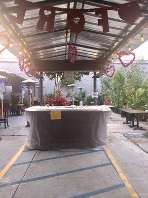 Outdoor patio decorations for Valentine's Day at Rudy's LA. Outdoor bar coming soon!