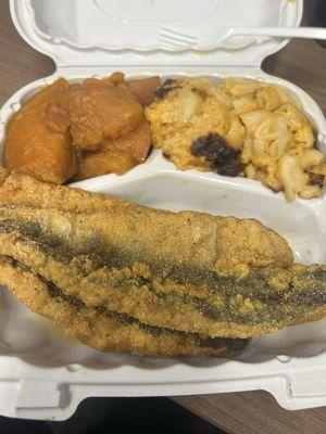 Fried fish, candied yams, and macaroni and cheese