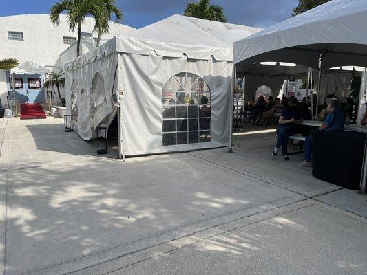 Courtyard tent where you gather prior to show