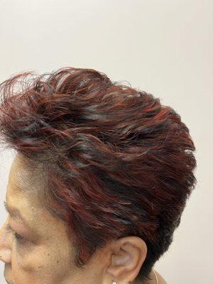 My client dark hair with some fashion red highlights