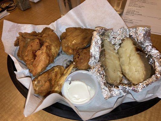 Fried chicken with a baked potato