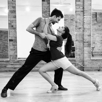 Two tango students preparing a show dance