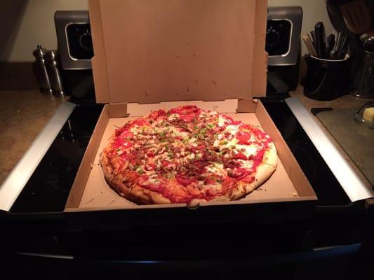 This extra large pizza is as big as my stovetop!