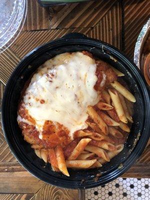 Chicken Cutlet Parmigiana entree with penne