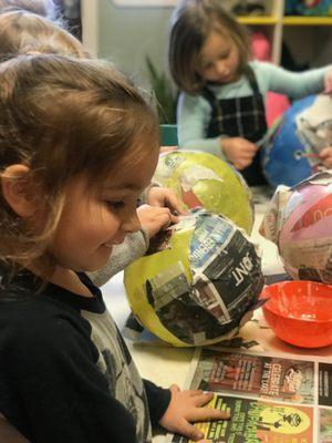 Making piñatas! It's not only fun, but it also helps children with their fine motor skills.