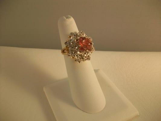 Rose carved spinel set in yellow gold and diamonds