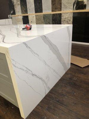 Look our job This is Calcutta white quartz we did it for bussenies place